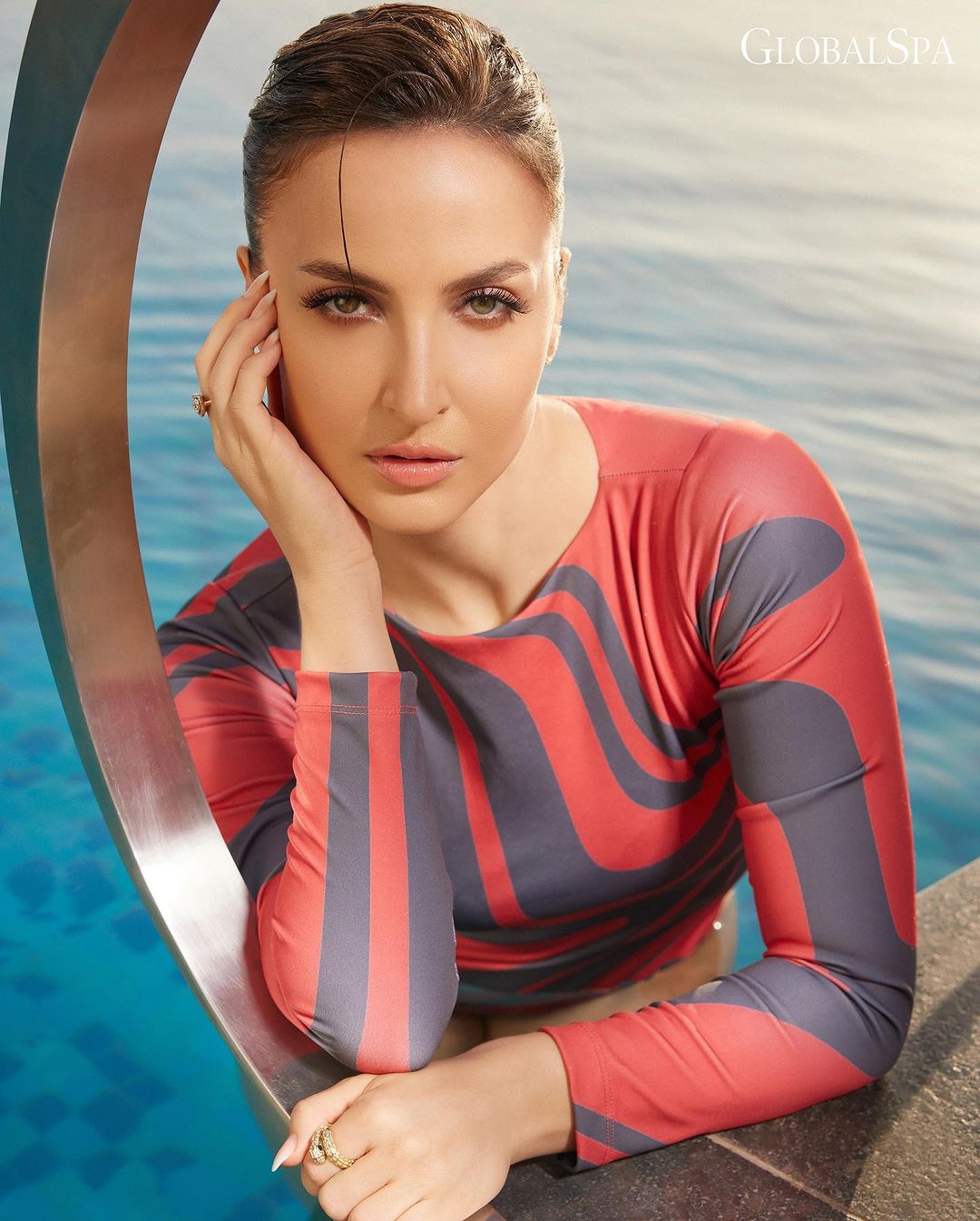 Bollywood Actress Elli AvrRam Images in Red SwimSuit